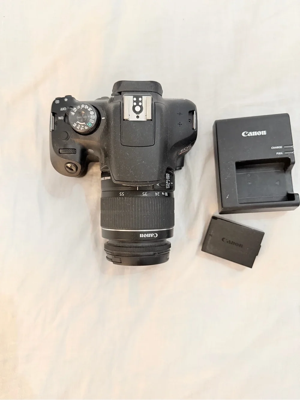 Canon Black DSLR with 18-55mm Lens, Battery and Charger